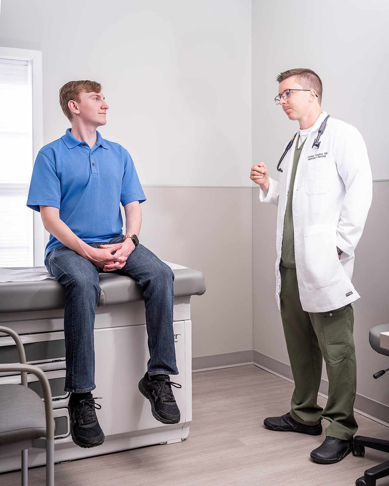 Doctors reviewing lab results on a computer