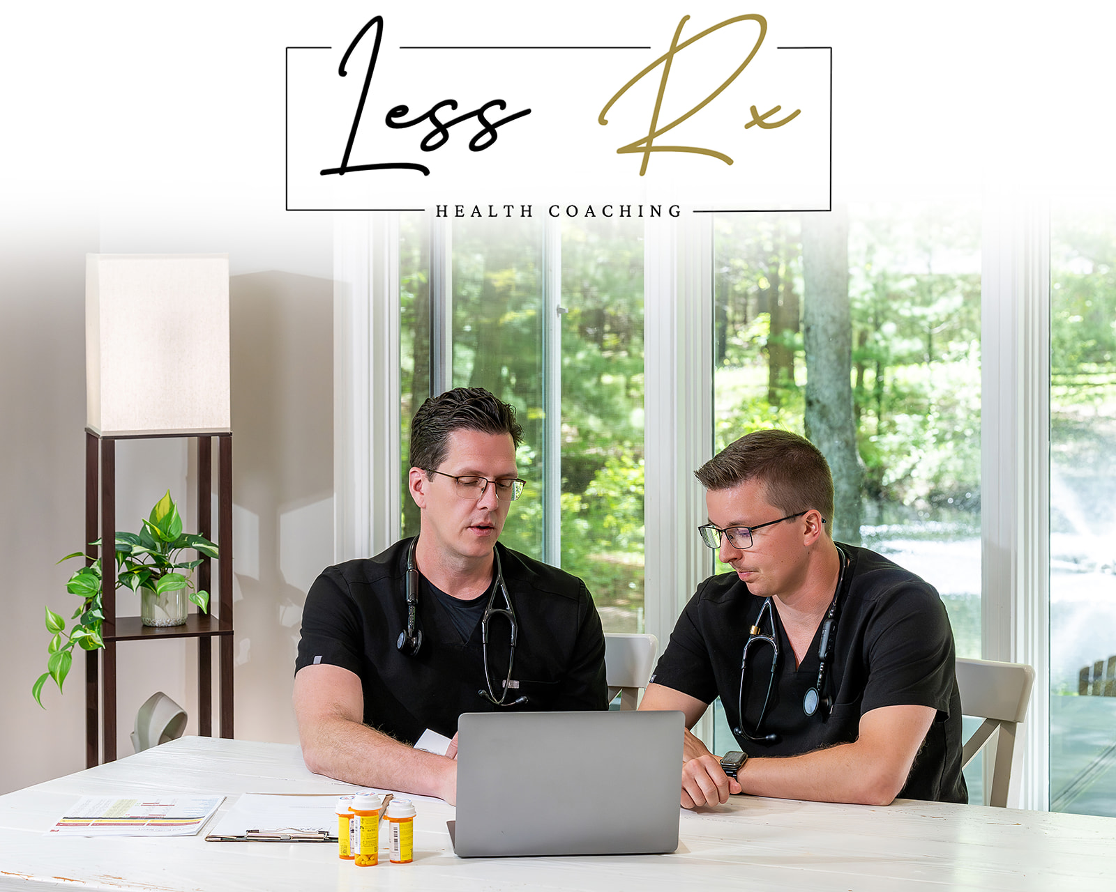 Doctors discussing lifestyle medicine on a laptop